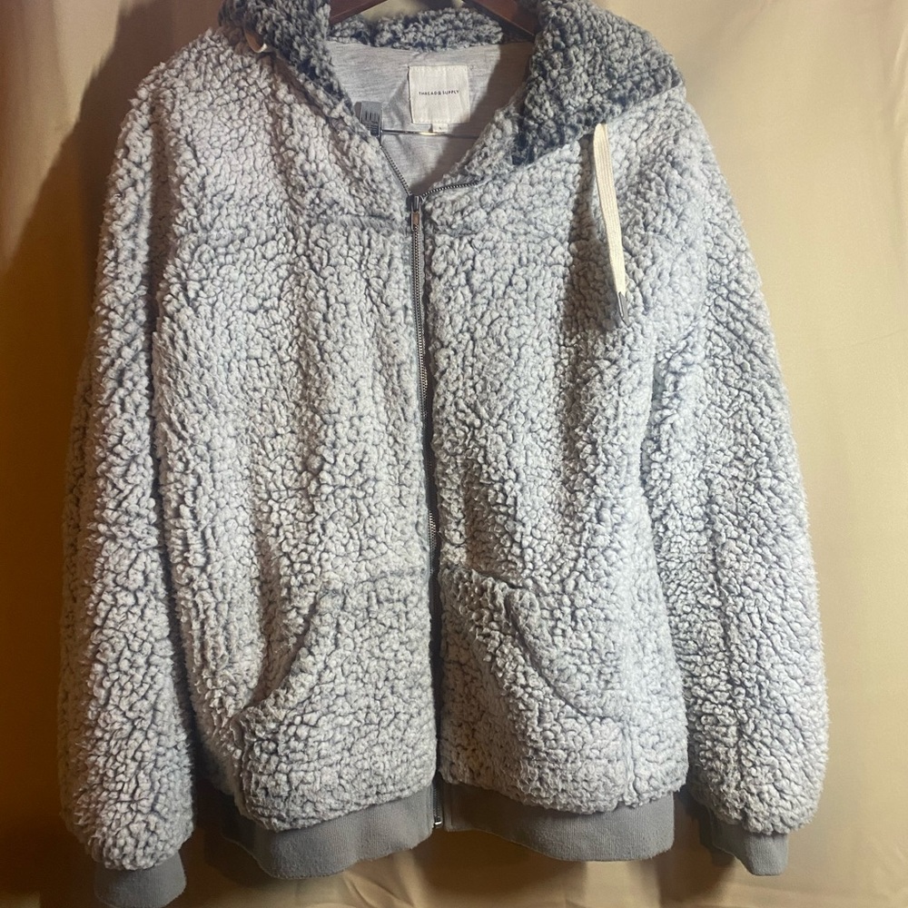 Thread and supply fluffy coat